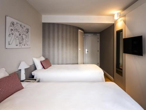 Ein Bett oder Betten in einem Zimmer der Unterkunft Ibis Valencia Alfafar