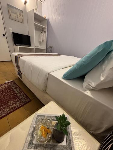 Ένα ή περισσότερα κρεβάτια σε δωμάτιο στο Milano 581 - Hospedaje temporal en Asunción
