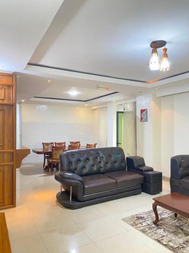 Posezení v ubytování KIGALI DYNAMICs HOMES AND HOTEL