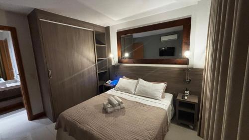 En eller flere senge i et værelse på FLAT Moderno próximo ao Riocentro - Rock in Rio - Projac - Farmasi Arena - Parque Olímpico