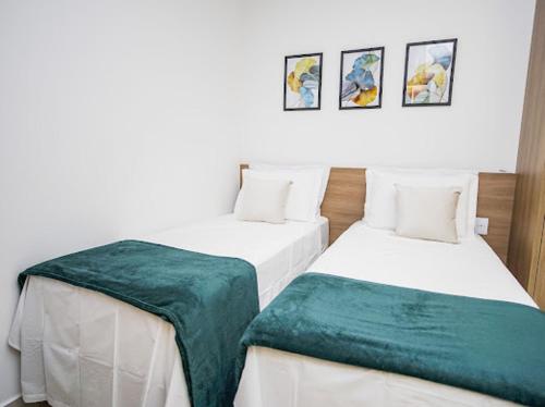 Llit o llits en una habitació de Premium Suite
