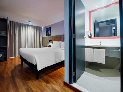 ibis Guarulhos Aeroportoにあるベッド