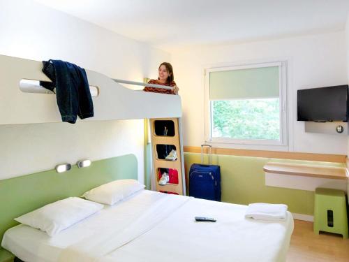 En eller flere senge i et værelse på Ibis budget Berlin Potsdamer Platz