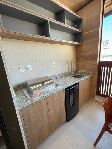 Η κουζίνα ή μικρή κουζίνα στο Village Duplex Guarajuba 4 suítes