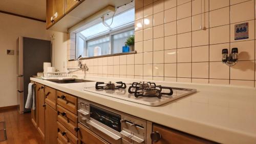 Dapur atau dapur kecil di 民泊たこち