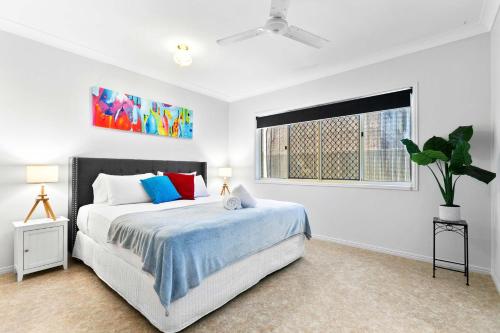 Ένα ή περισσότερα κρεβάτια σε δωμάτιο στο Coastal Bliss - 6 Beds Holiday House