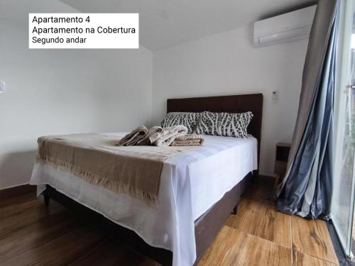 Katil atau katil-katil dalam bilik di VILA 5 - Apartamentos Executivos