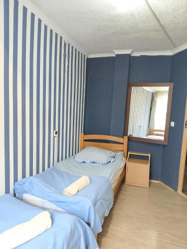 Un ou plusieurs lits dans un hébergement de l'établissement Sweetnight