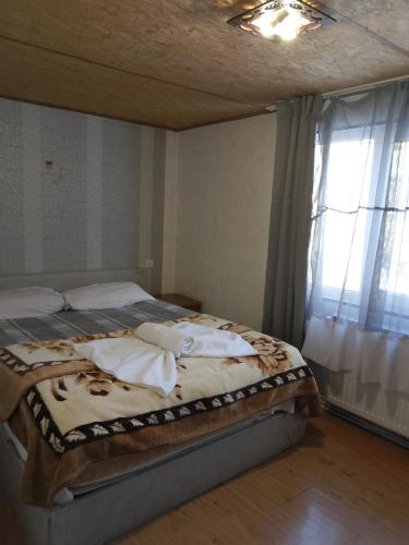 Un ou plusieurs lits dans un hébergement de l'établissement Sweetnight
