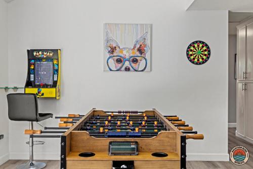 a game room with a foosball table at 4BR Chula Vista Getaway Splash, Play & Game! in Chula Vista