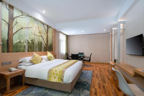 Yun'an Huidu Hotelにあるベッド