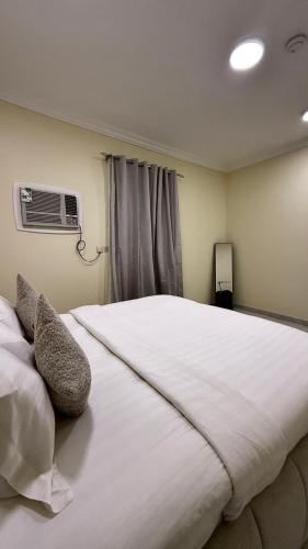 Postel nebo postele na pokoji v ubytování ستاي كوزي Stay Cozy