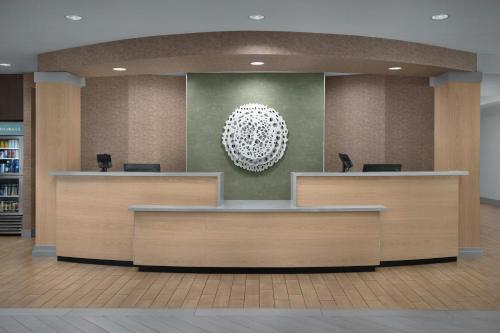 a rendering of a waiting area in a library at Fairfield Inn & Suites Fort Lauderdale Airport & Cruise Port in Dania Beach