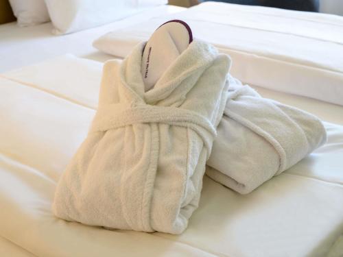 Una cama o camas en una habitación de Mercure Hotel Berlin City