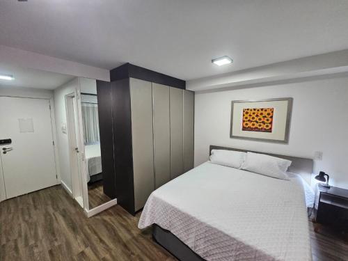 Vuode tai vuoteita majoituspaikassa Studio Bem Localizado - Moema