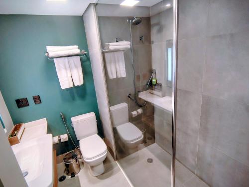 Ένα μπάνιο στο The Capital Flat Luxo Itaim Bibi