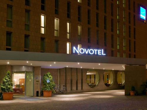 a novation sign on the front of a hotel at Novotel Freiburg am Konzerthaus in Freiburg im Breisgau