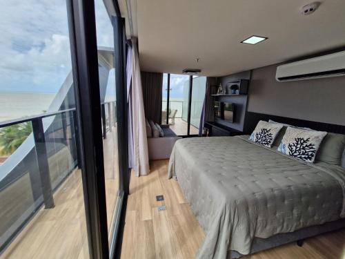 Letto o letti in una camera di Luxo e vista privilegiada Mar de Cabo Branco