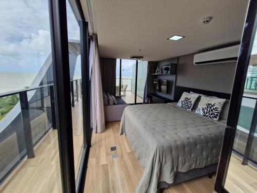 Letto o letti in una camera di Luxo e vista privilegiada Mar de Cabo Branco