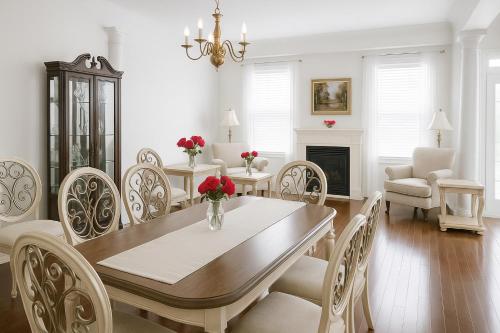 a dining room with a table and chairs at Luxurious Detached Master BR in Markham