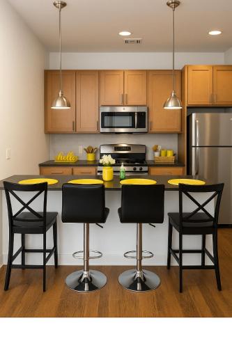 a kitchen with yellow tables and black chairs at Drop Your Bags In Your 2 Bdrm, 2 Full Bath Condo In French Quarters Prime Location in New Orleans