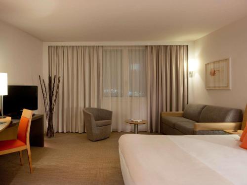 Letto o letti in una camera di Novotel Paris Roissy CDG Convention