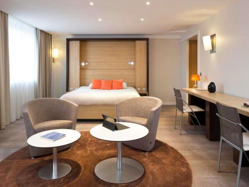 Letto o letti in una camera di Novotel Paris Roissy CDG Convention