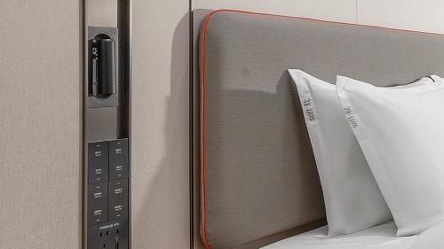Ένα ή περισσότερα κρεβάτια σε δωμάτιο στο Holiday Inn Express Chenzhou Suxian by IHG