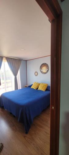 Cama o camas de una habitación en Cabaña Tunquen