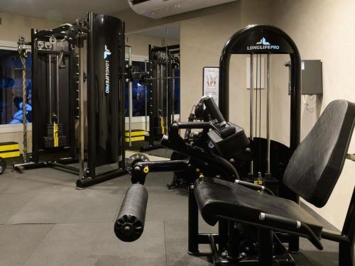a gym with lots of equipment in a room at ibis Aracaju in Aracaju
