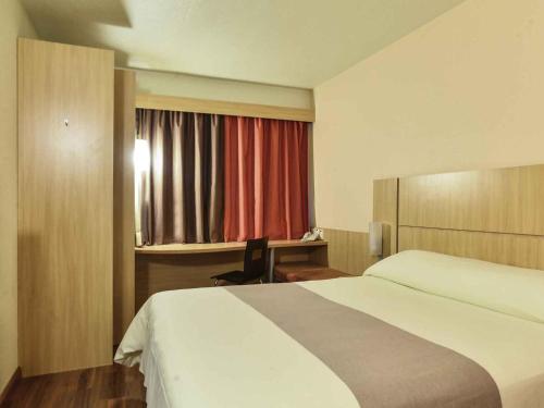 ibis Caxias do Sulにあるベッド