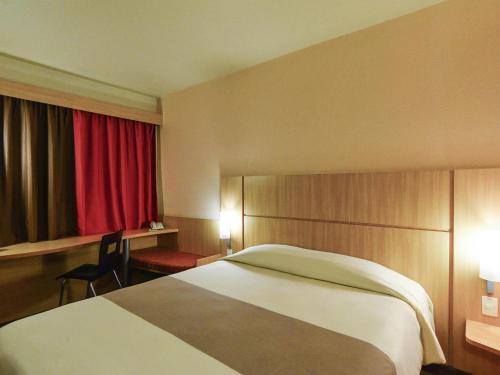 ibis Caxias do Sulにあるベッド