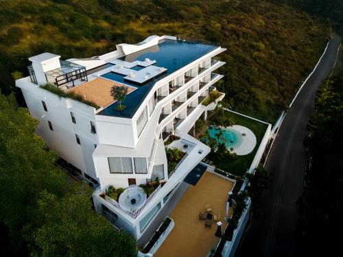 an aerial view of a house with a swimming pool at YS Seaview Hotel in Dali