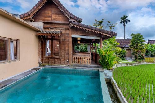 Бассейн в Taksu Sebatu Villa by Dhananjaya Hospitality или поблизости