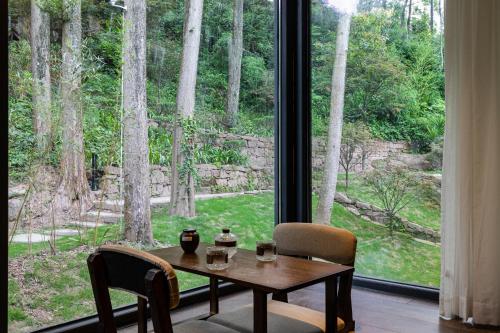 Zahrada ubytování Qingcheng Mountain Jiuxipo · Mountain Stream Bamboo Forest Private Hot Spring Homestay