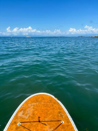 a wooden boat in the middle of the water at 葉山ヒュッゲ in Hayama