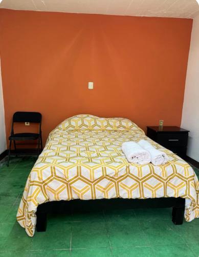 Postel nebo postele na pokoji v ubytování Casa tulipán