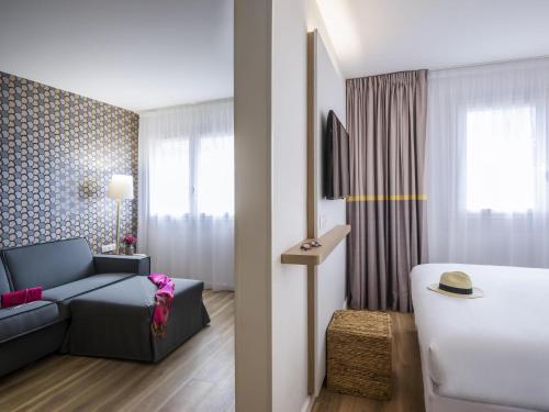 Un ou plusieurs lits dans un hébergement de l'établissement ibis Styles Nice Cap 3000 Aéroport