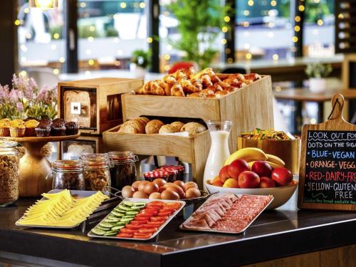 a buffet of different types of food on a table at ibis Bristol Centre in Bristol