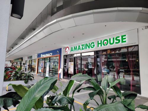 a building with a amazon amazing house sign on it at Trion Residence Kuala Lumpur by Centrix in Kuala Lumpur
