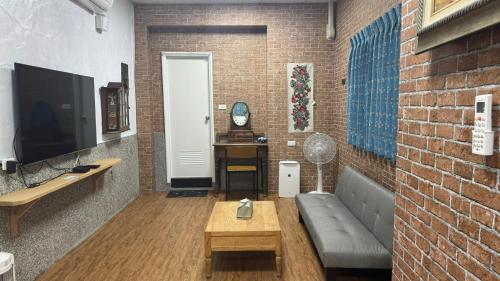 Télévision ou salle de divertissement dans l'établissement 台南民宿舞鶴