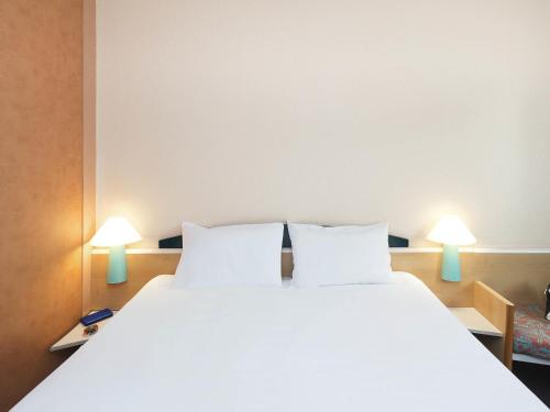Cama o camas de una habitación en ibis Luxembourg Sud