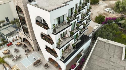 an overhead view of a building with balconies at Amarea Boutique Hotel in Dhërmi