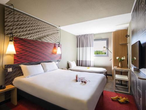 ibis Manosque Cadaracheにあるベッド