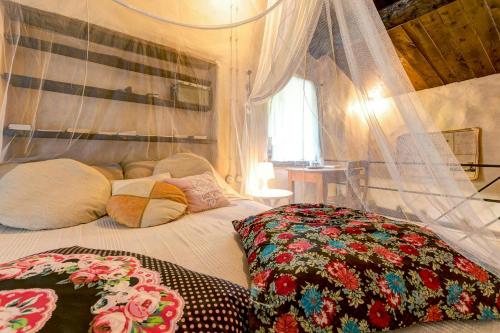 Katil atau katil-katil dalam bilik di Historic Mill With Pool In The Heart Of Tuscany