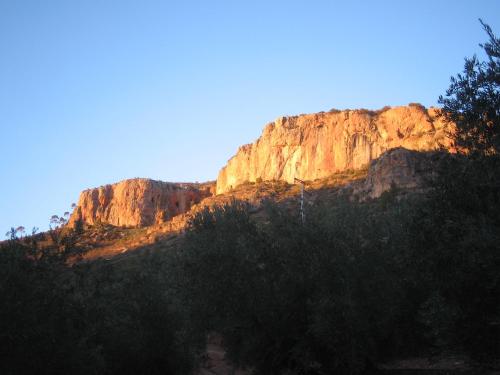 a view of a mountain with trees in front of it at Cortijo el Nolo in Chincolla