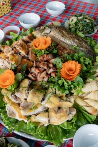 a plate of food on a table at Gia Trang Heian Hoa Binh in Hòa Bình