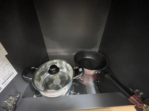 a pot sitting on top of a counter at モリアパートメント 102 in Wada