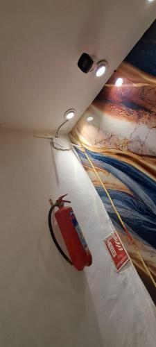 a room with a painting on the wall at SBS Hotel Underbridge in Jāmb