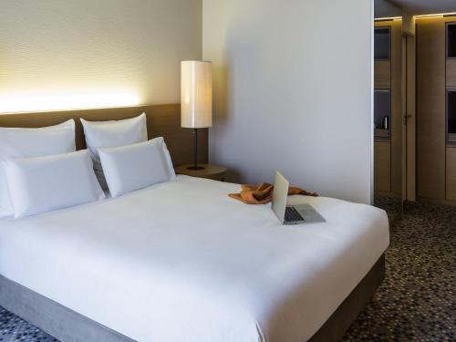 Cama o camas de una habitación en Pullman Basel Europe
